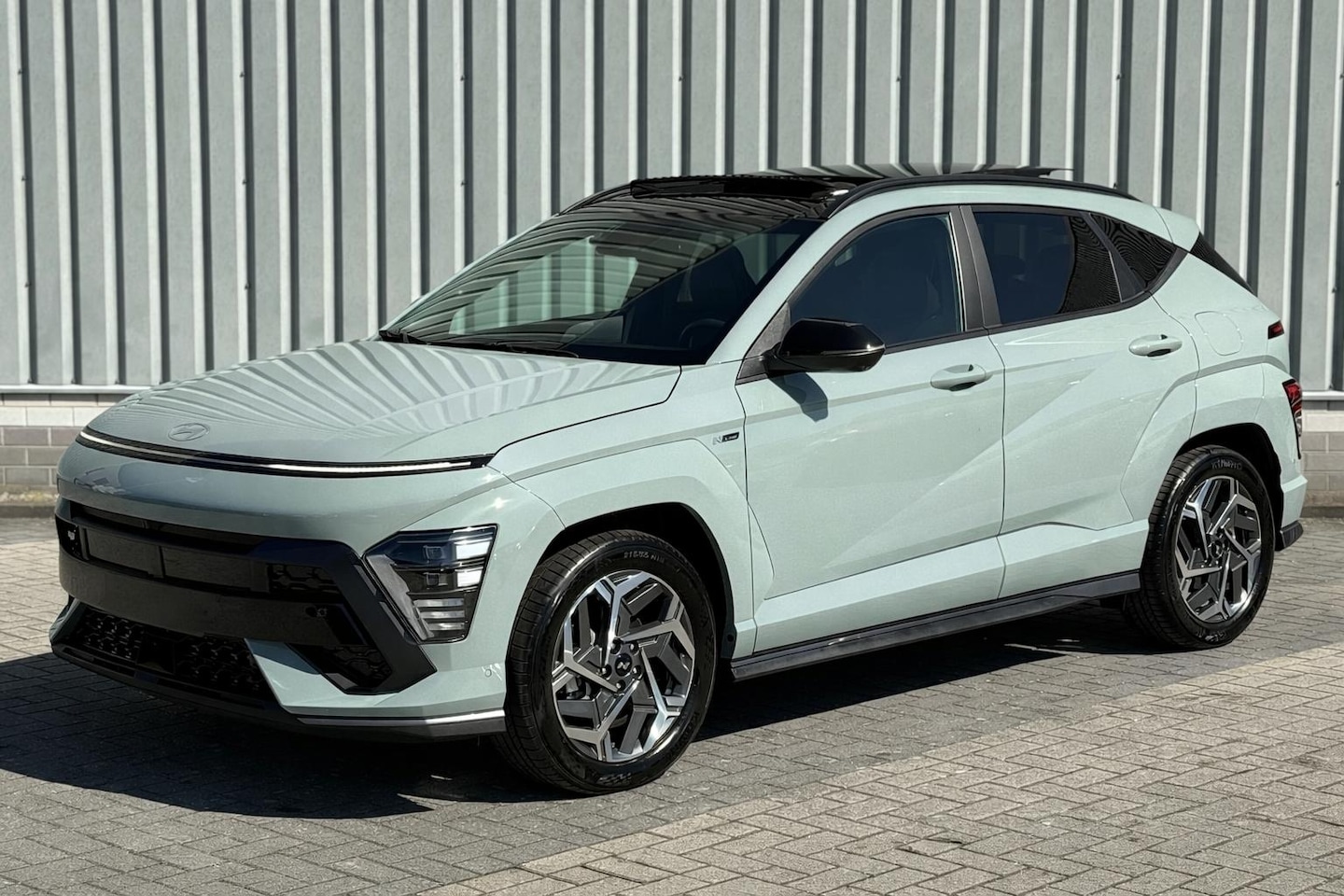 Hyundai Kona - 1.6 GDI HEV N Line Sky / Stoel verwarming/verkoeling / Schuif/Kantel dak / Parkeerassisten - AutoWereld.nl