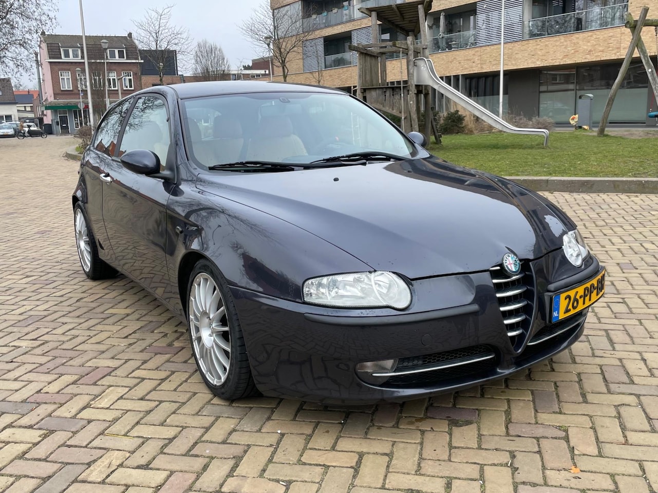 Alfa Romeo 147 - 1.6 T.Spark Lusso 1.6 T.Spark Lusso, 3drs, Airco, CarPlay, Cam, Leder, Lmv, Spoiler, Sport, Geen import, Nap - AutoWereld.nl