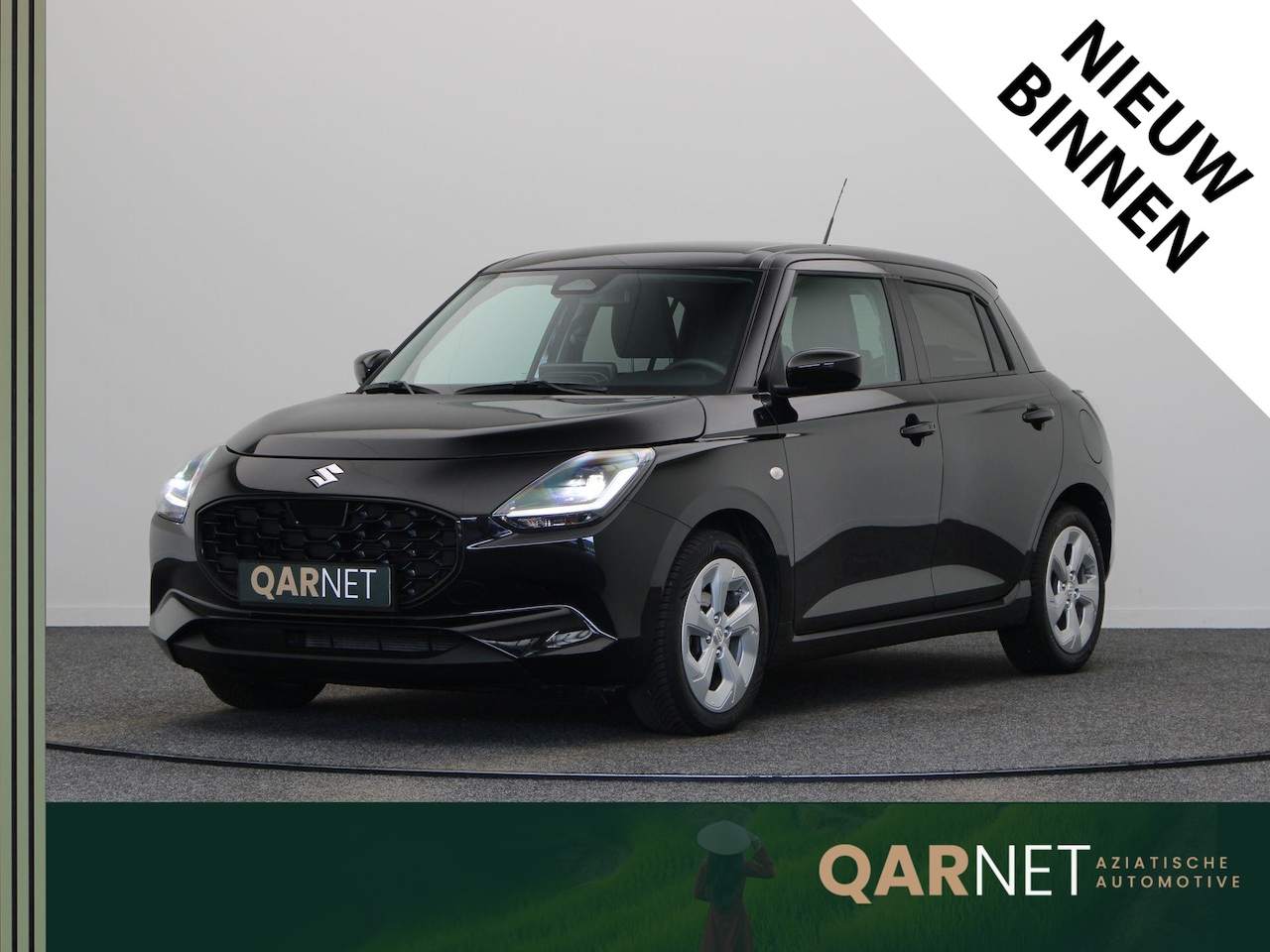 Suzuki Swift - 1.2 Comfort Smart Hybrid | Led | Stoelverwarming | All season | Apple carplay & Android au - AutoWereld.nl