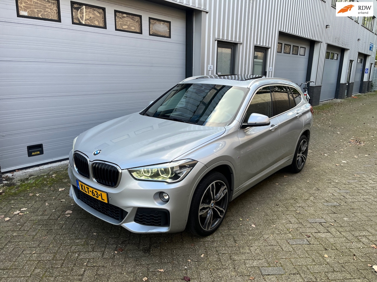 BMW X1 - SDrive18d Centennial High Executive! Pano! M-pakket! - AutoWereld.nl