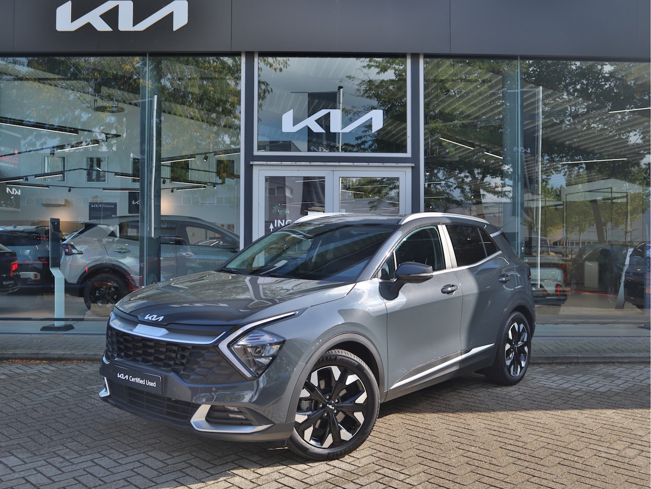 Kia Sportage - 1.6 T-GDi Plug-in Hybrid AWD DynamicLine | Camera | Navigatie | Cruise Control  | ECC-Airc - AutoWereld.nl