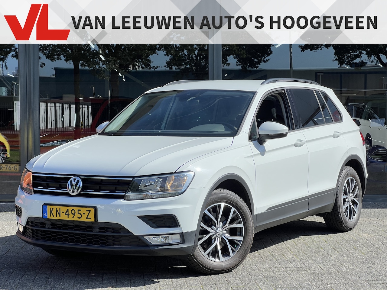 Volkswagen Tiguan - 1.4 TSI Trendline | Trekhaak | RIJKLAAR | Navi - AutoWereld.nl