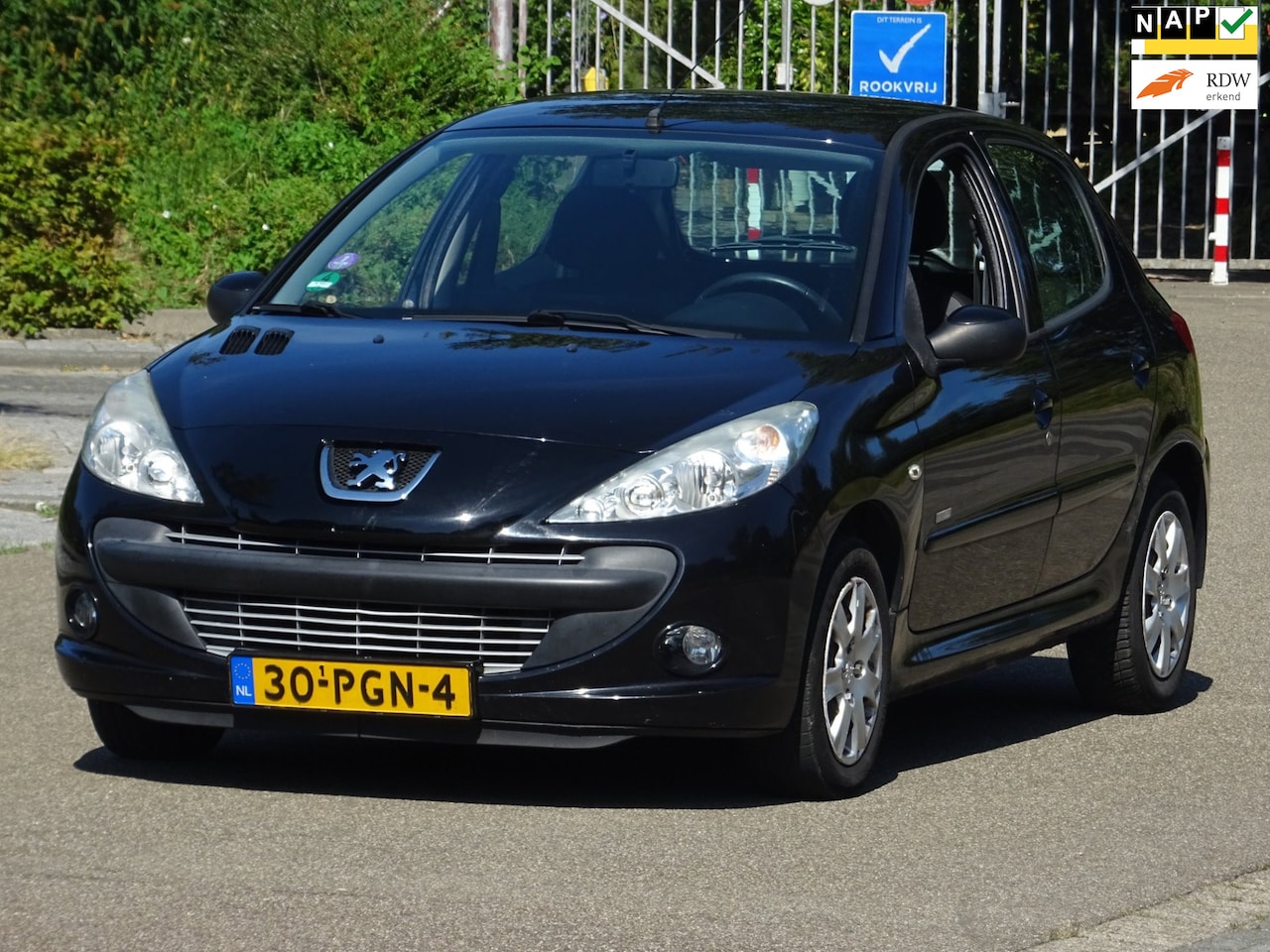 Peugeot 206 - 1.4 Millesim 200 BJ2011 5DRS NAP/AIRCO/NW APK - AutoWereld.nl