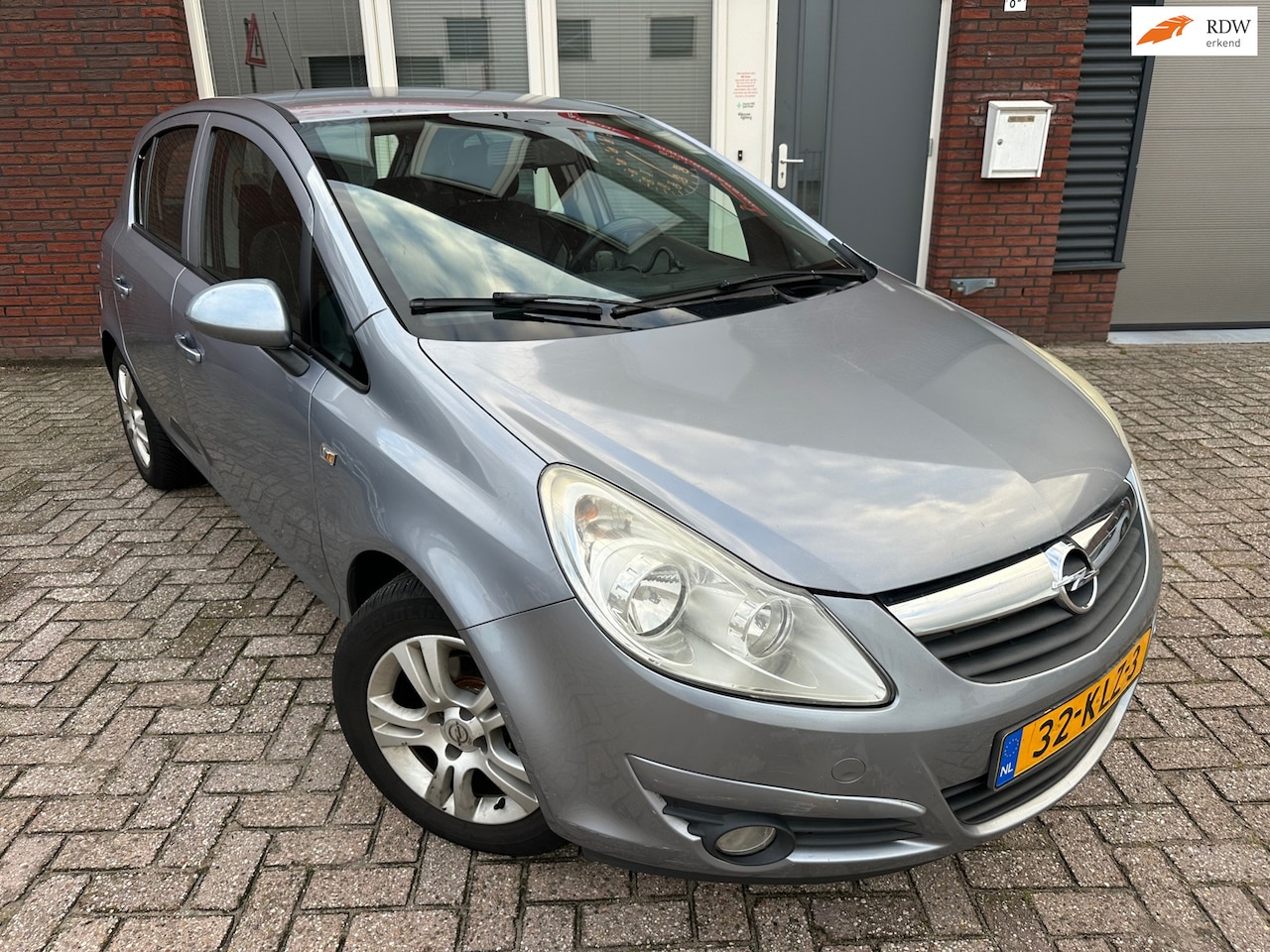 Opel Corsa - 1.2-16V Enjoy / Airco / Cruise / 5DRS / LM / NAP - AutoWereld.nl