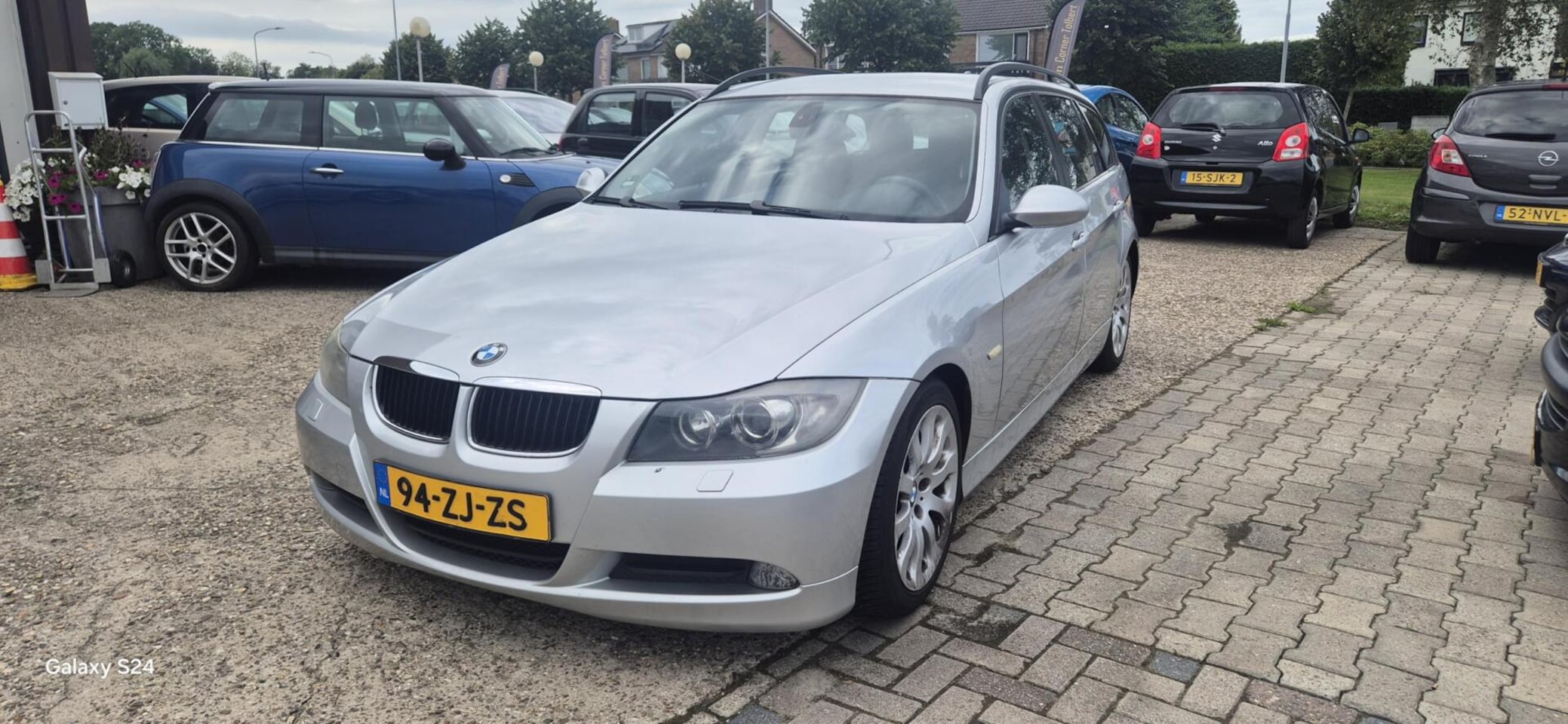 BMW 3-serie Touring - 320i High Executive - AutoWereld.nl