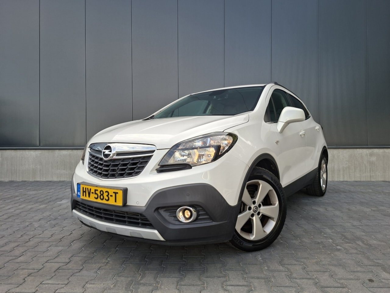 Opel Mokka - 1.4 T Cosmo | Bluetooth | Half lederenbekleding | Camera | Goed onderhouden - AutoWereld.nl