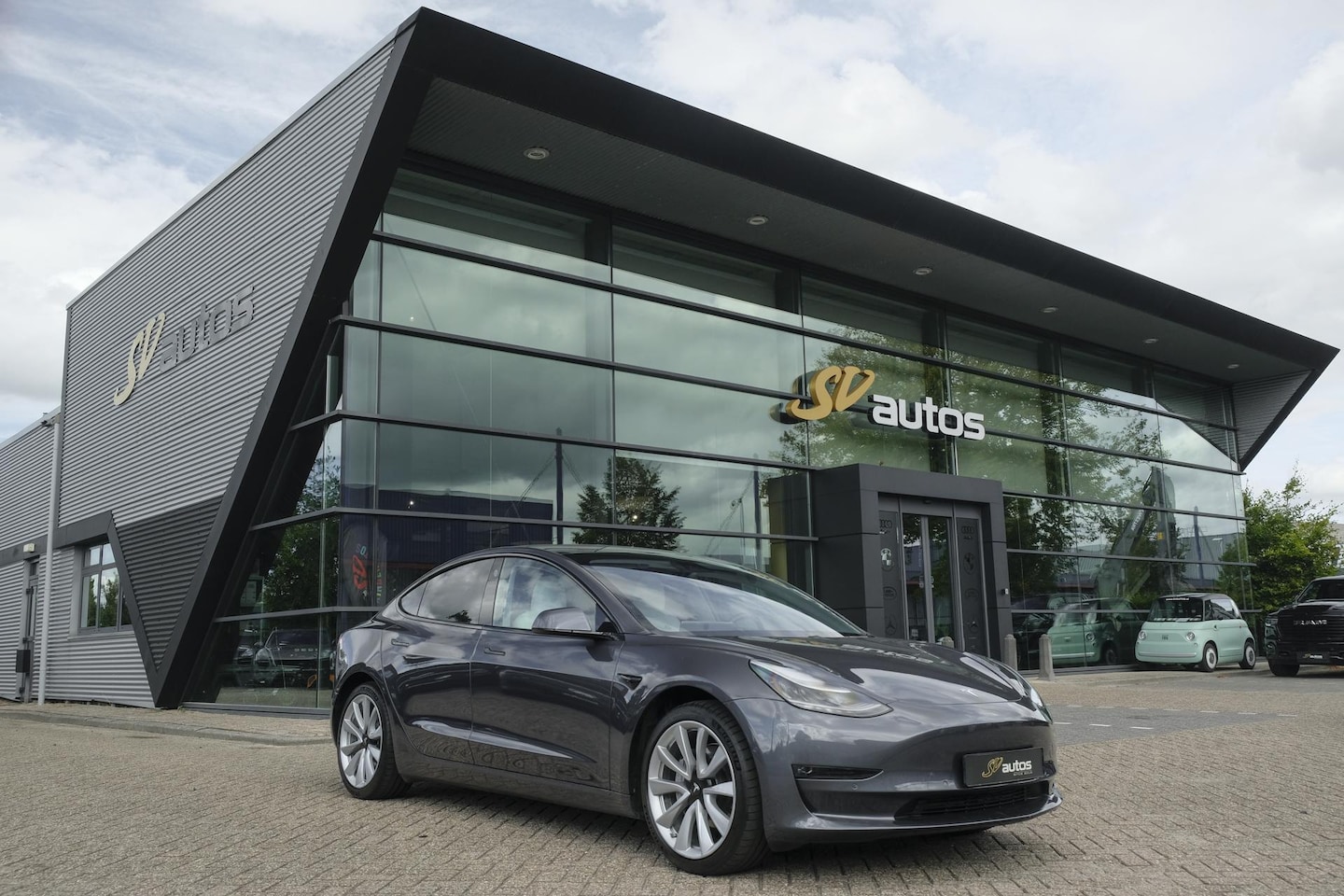 Tesla Model 3 - Long Range 351pk AWD 75 kWh *BTW* *SOH 85%* Panoramadak 19" LMV Sport Autopilot - AutoWereld.nl