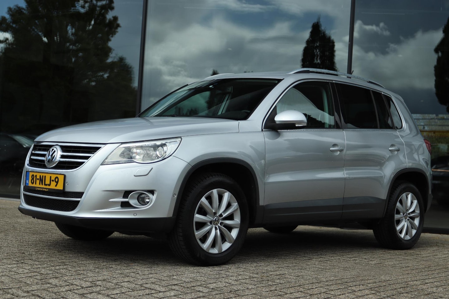 Volkswagen Tiguan - 2.0 TSI SPORT&STYLE 4MOTION | XENON | TREKHAAK | CARPLAY | CAMERA | - AutoWereld.nl