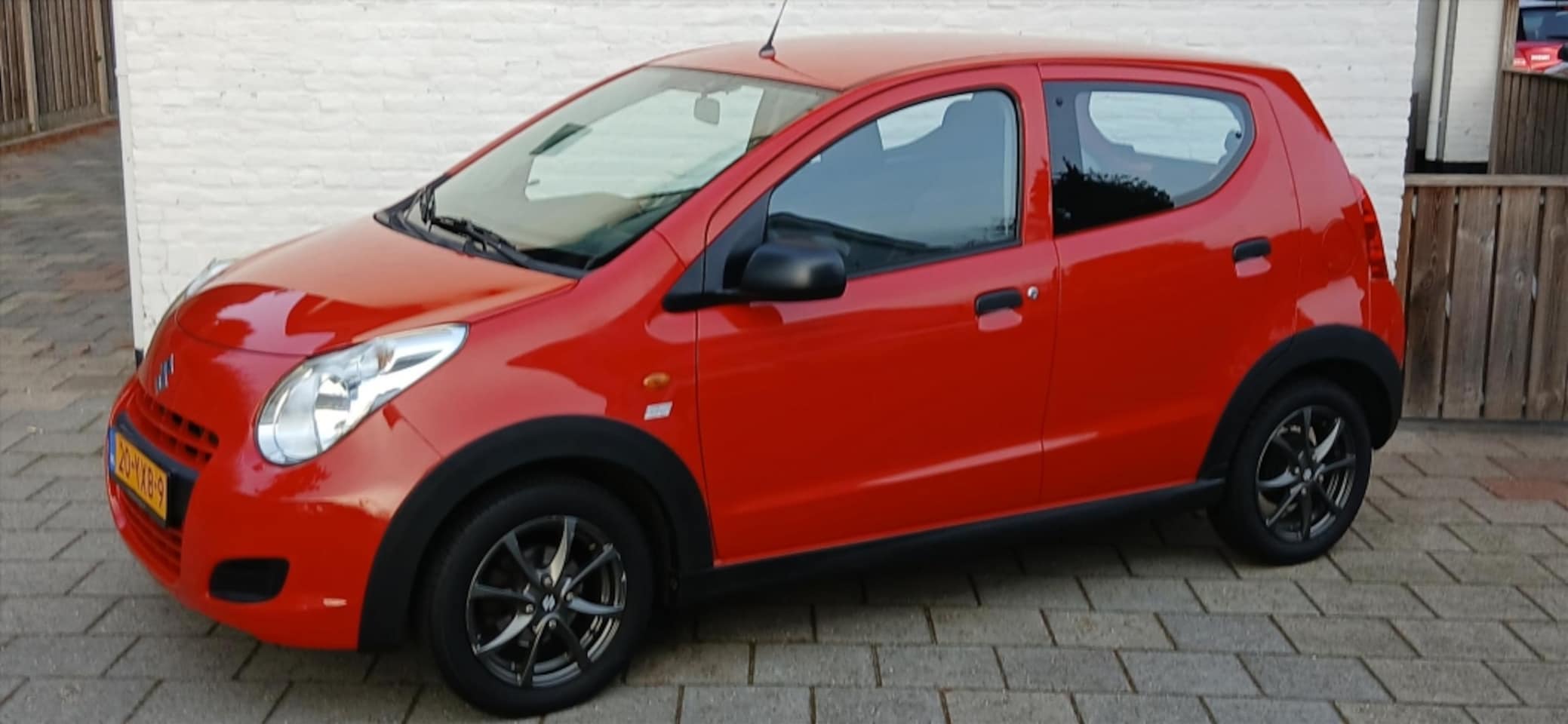 Suzuki Alto - 1.0 5drs Comfort gt body kit airco lmv - AutoWereld.nl