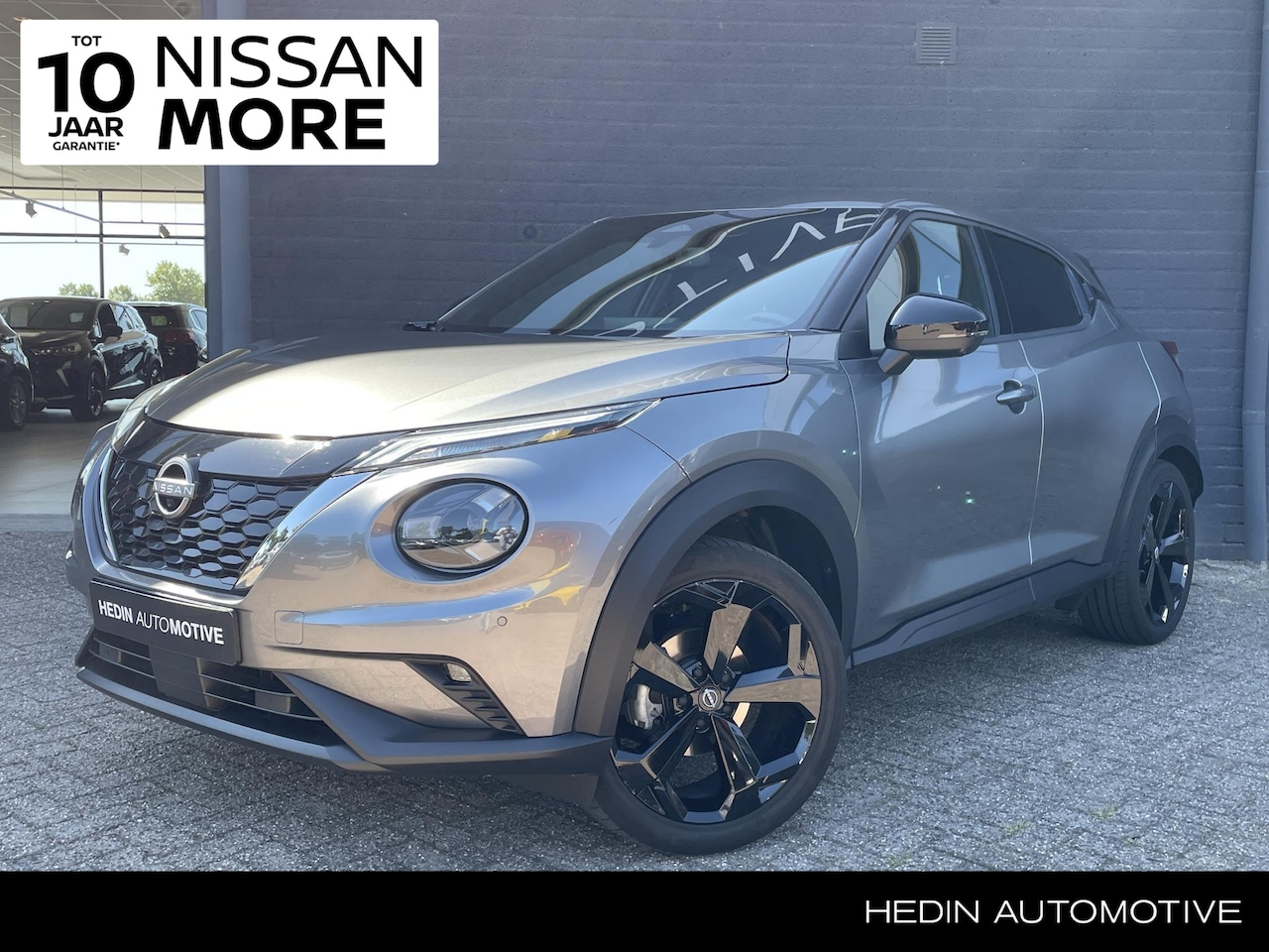 Nissan Juke - 1.6 Hybrid Tekna | BOSE | 360 Graden Camera | Adapt Cruise | Navigatie - AutoWereld.nl