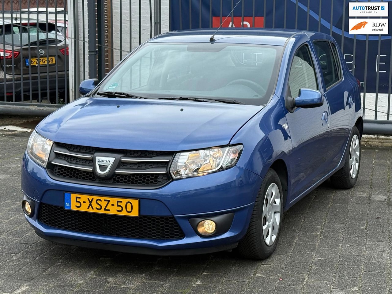 Dacia Sandero - 0.9 TCe Lauréate / AIRCO / CRUISE CONTROL / TREKHAAK / NAP!! - AutoWereld.nl