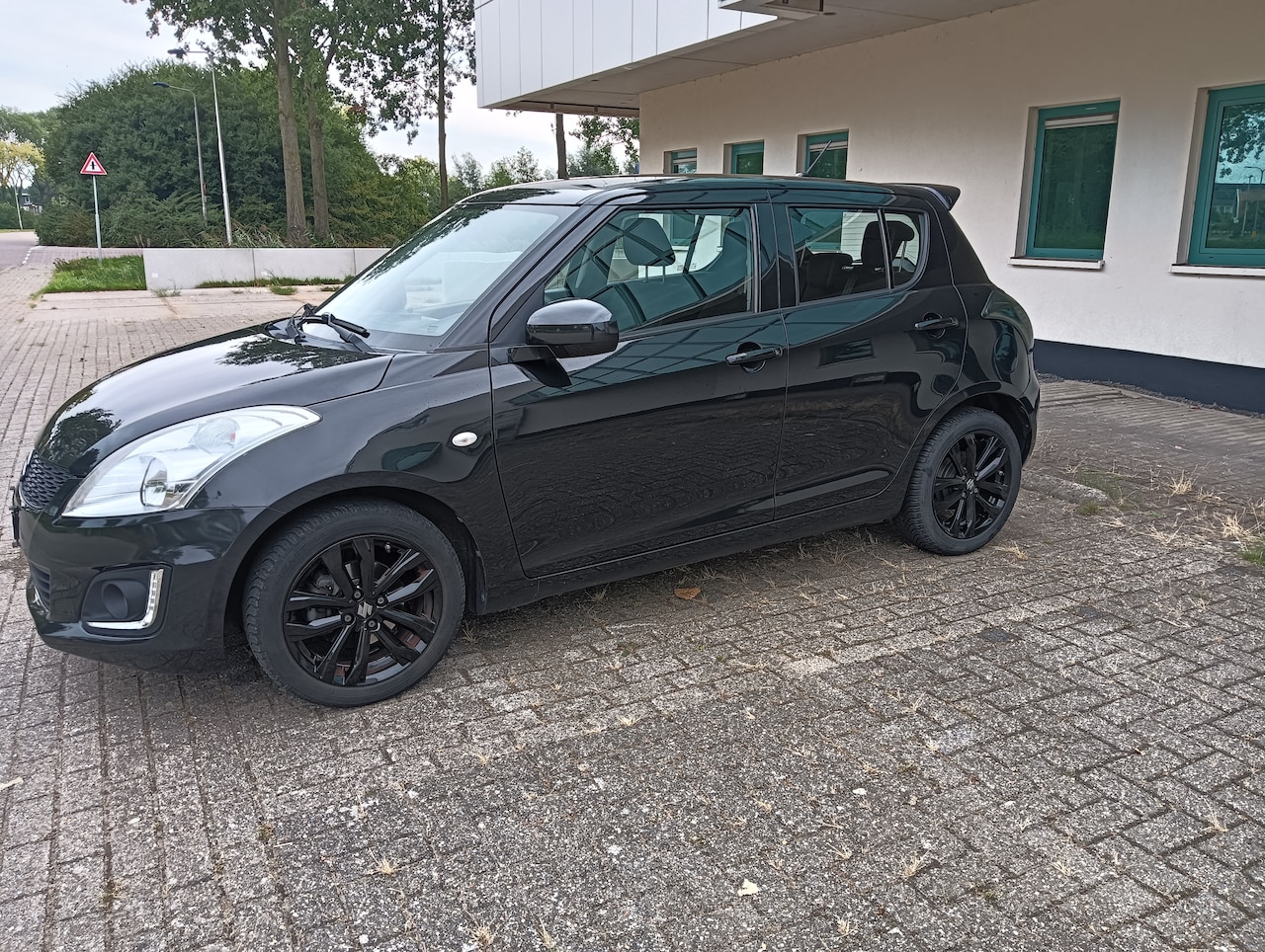 Suzuki Swift - 1.2 S-Edition EASSS Airco. Cruise control. Stoelverwarming - AutoWereld.nl
