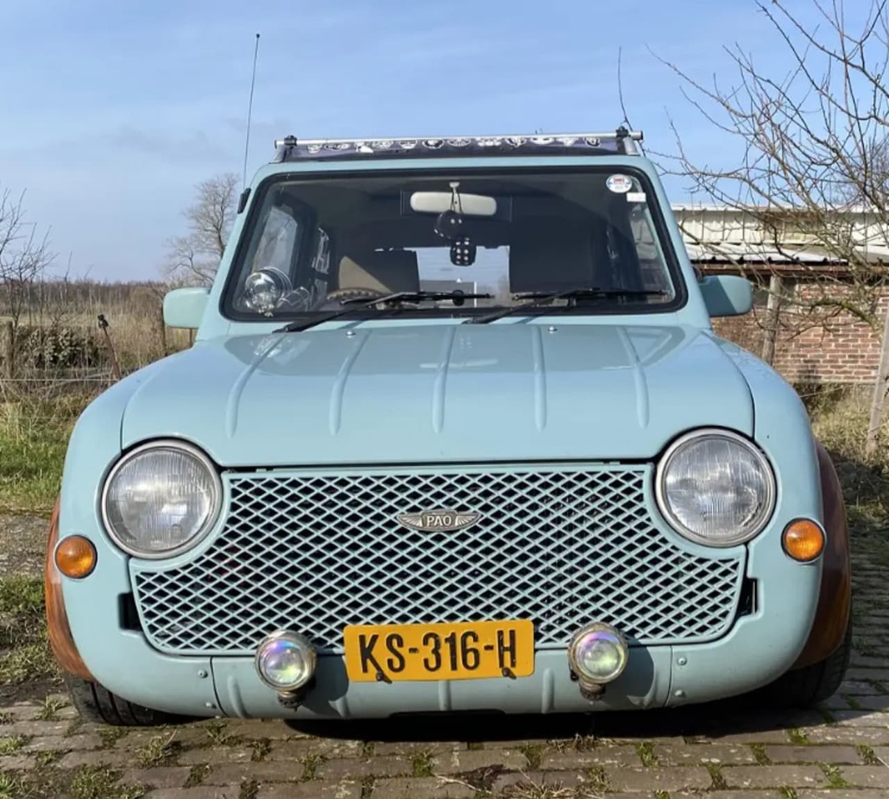 Nissan Micra - Nissan Pao 'woody' - AutoWereld.nl