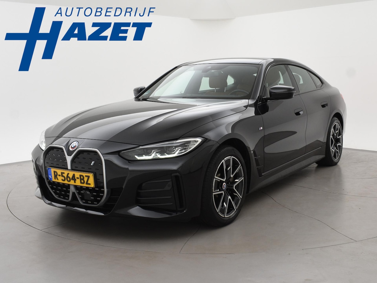 BMW i4 - eDrive40 84 kWh M-SPORT + ADAPTIVE CRUISE | SFEERVERLICHTING | LEDER SPORTINTERIEUR - AutoWereld.nl