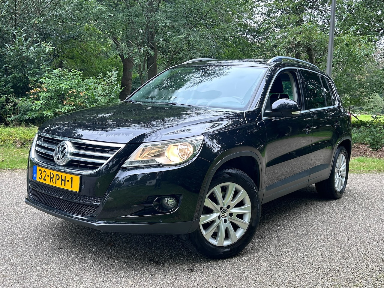 Volkswagen Tiguan - 1.4 TSI Sport&Style Navi boekjes twee sleutels.   Zeer nette auto. - AutoWereld.nl