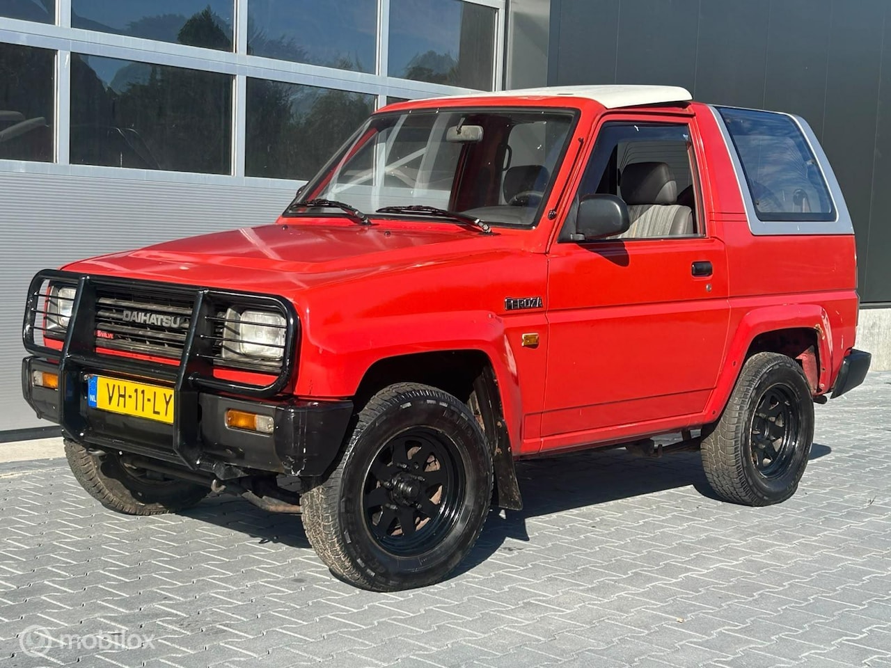 Daihatsu Feroza - DX 1.6 ResinTop, NAP, weinig roest - AutoWereld.nl
