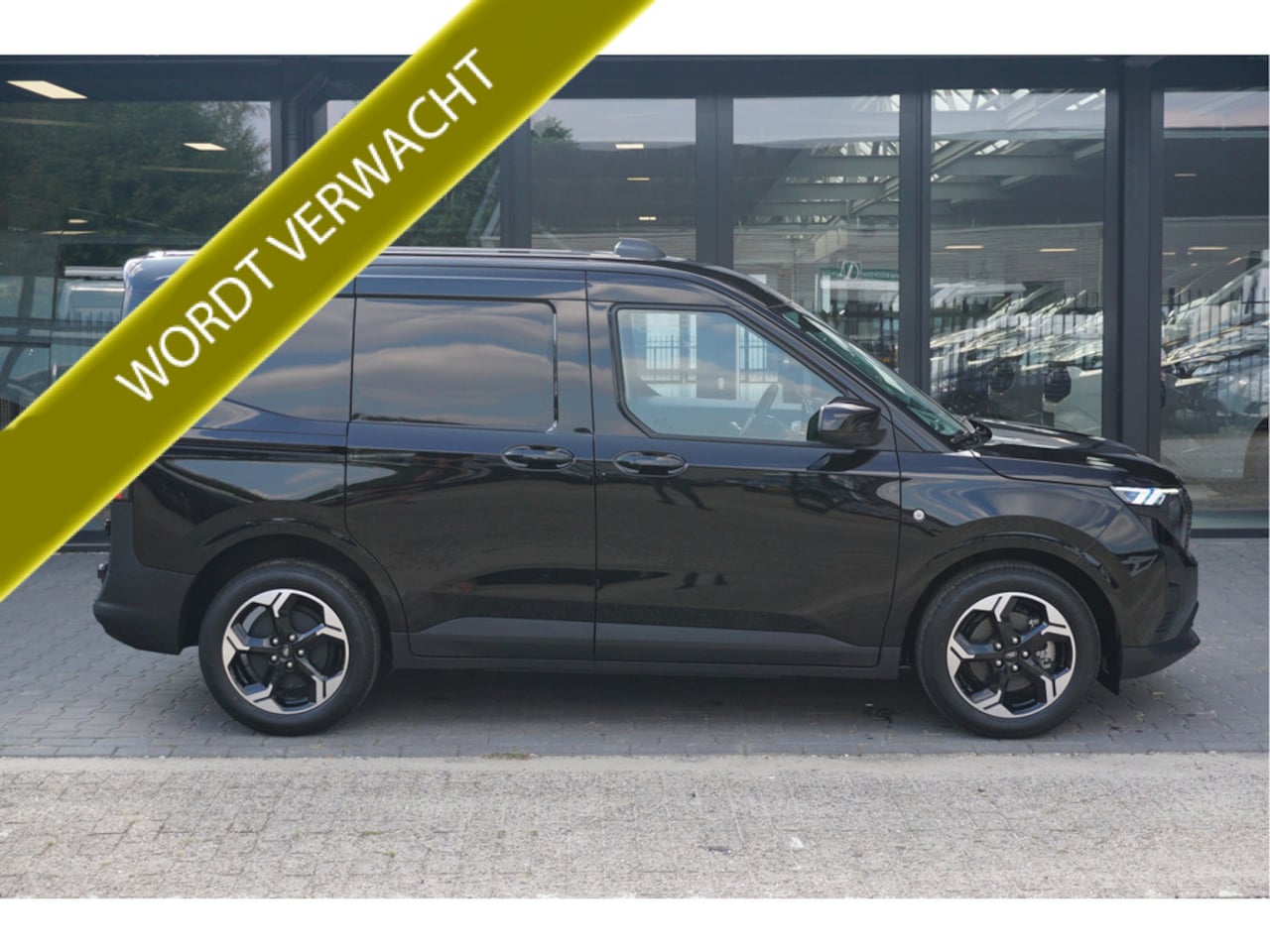 Ford Transit Courier - E-Transit Limited 44 kWh 136PK Automaat Airco | Cruise | Apple CP-Android | Trekhaak - AutoWereld.nl