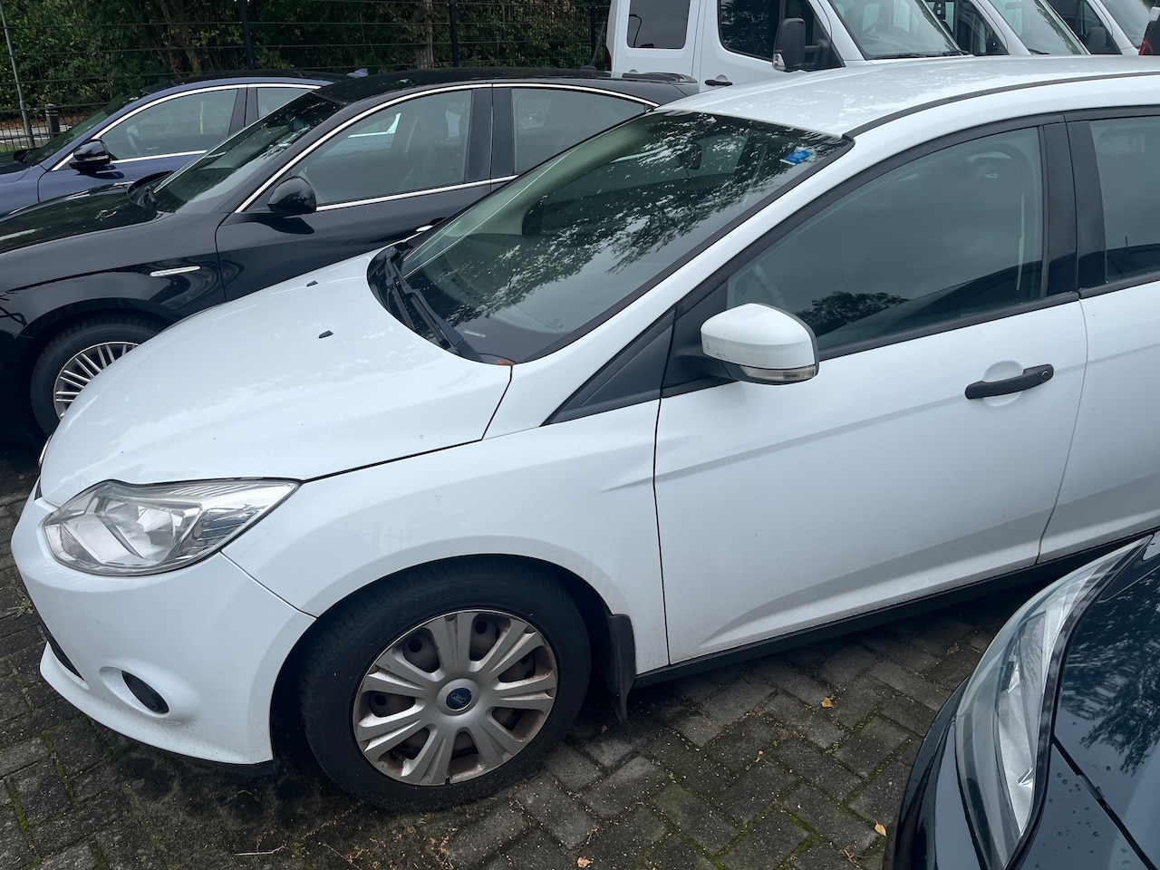 Ford Focus Wagon - 1.0 EcoBoost Titanium motorschade. - AutoWereld.nl