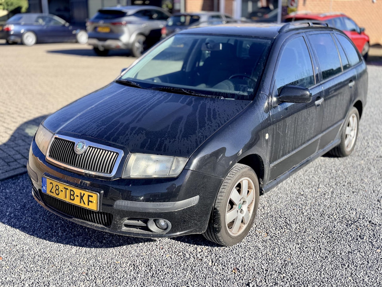 Skoda Fabia Combi - 1.4 74KW - AutoWereld.nl