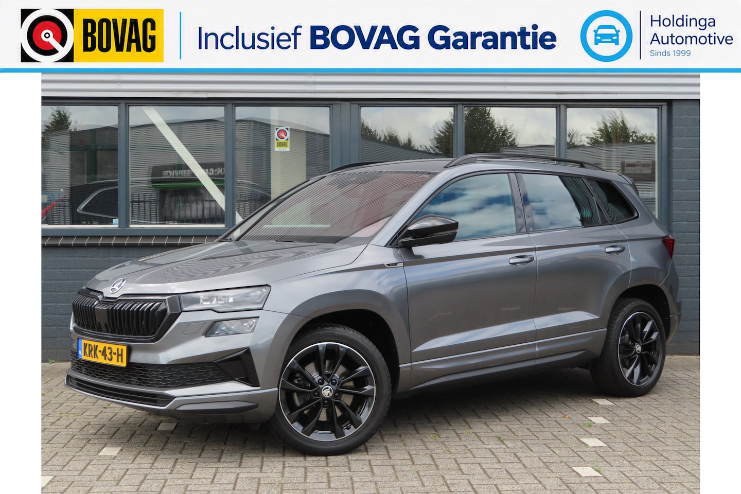 Skoda Karoq - 1.5 TSI ACT Sportline Business | trekhaak wegklapbaar | verwarmbare voorruit | DCC | voors - AutoWereld.nl