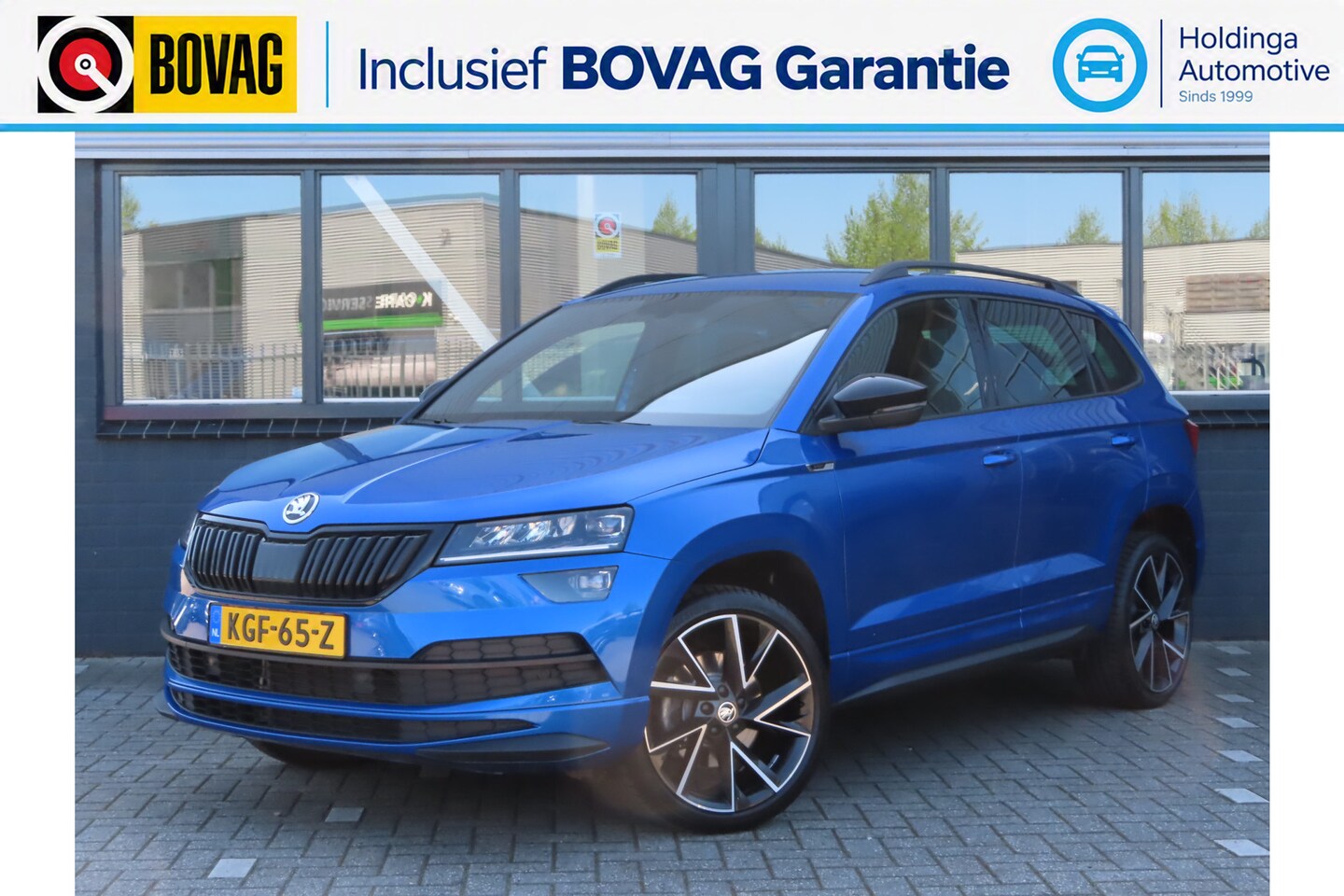 Skoda Karoq - 1.5 TSI ACT Sportline Business | trekhaak wegklapbaar | camera | Elektrisch bedienbare ach - AutoWereld.nl