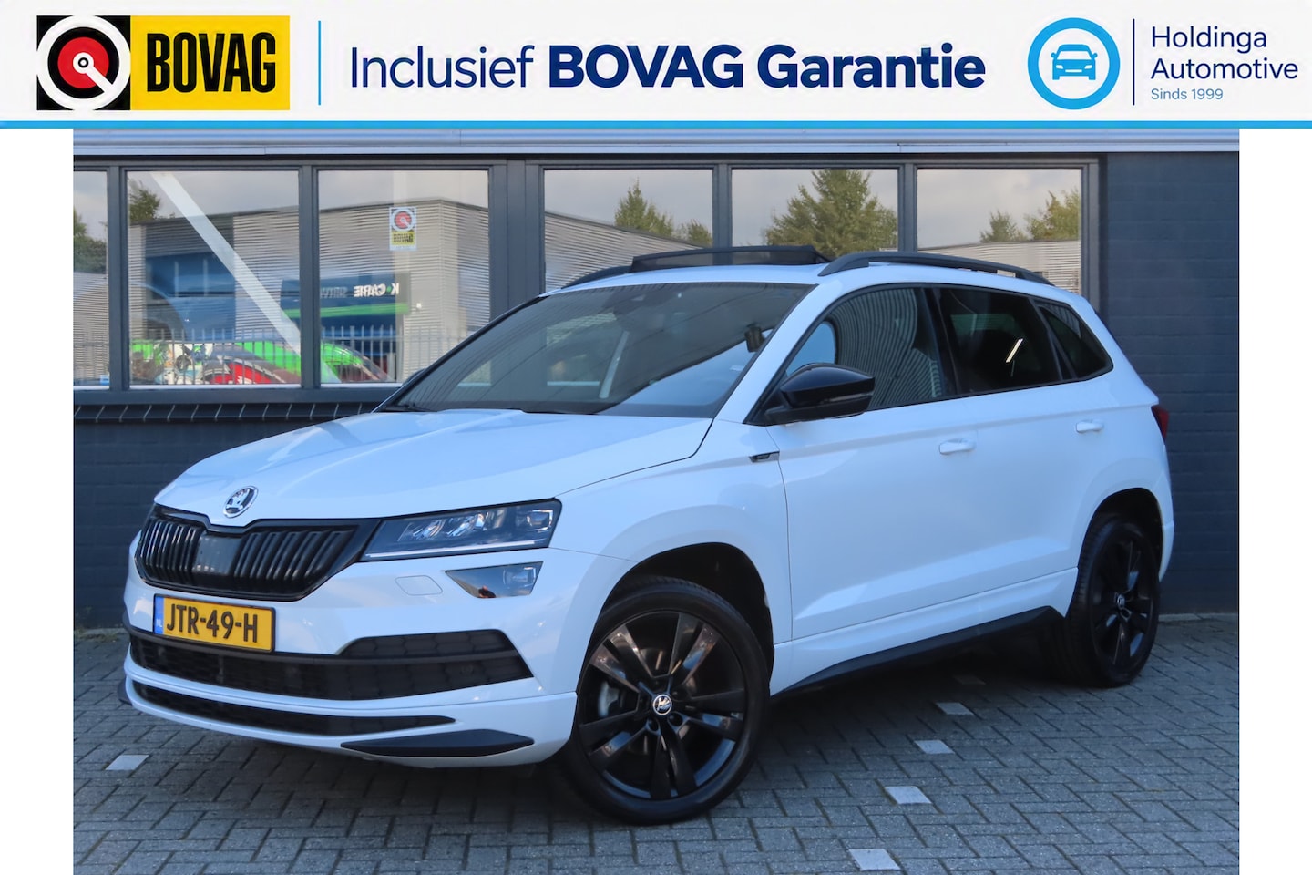 Skoda Karoq - 1.5 TSI ACT Sportline Business DSG | pano dak | elektrische achterklep | virtual cockpit - AutoWereld.nl
