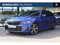 BMW 3-serie Touring - 330e M Sport Automaat / Sportstoelen / Achteruitrijcamera / Adaptieve LED / Getint glas /