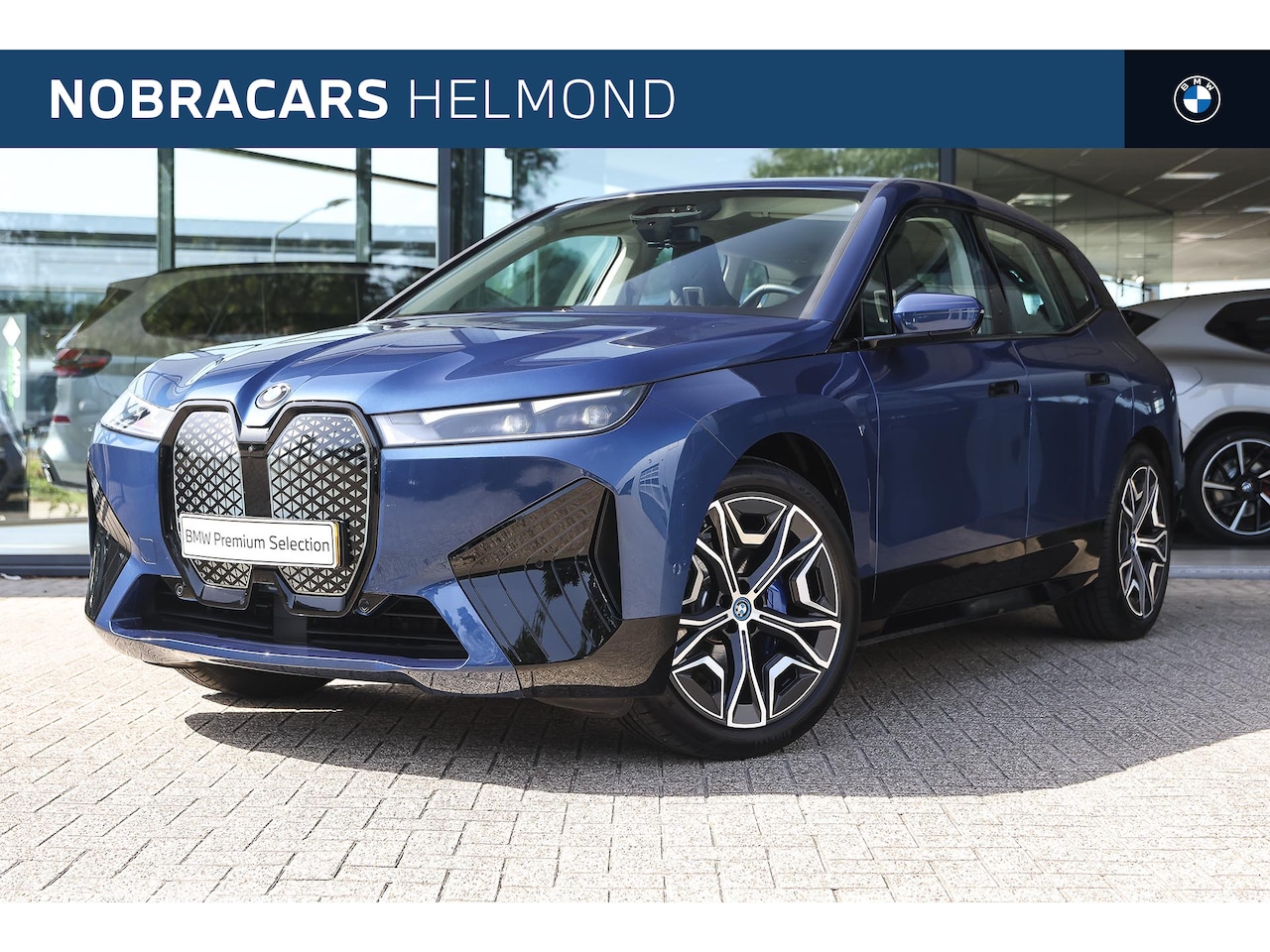 BMW iX - xDrive40 High Executive / Sportpakket / Comfort Access / Stoelverwarming / Parking Assista - AutoWereld.nl