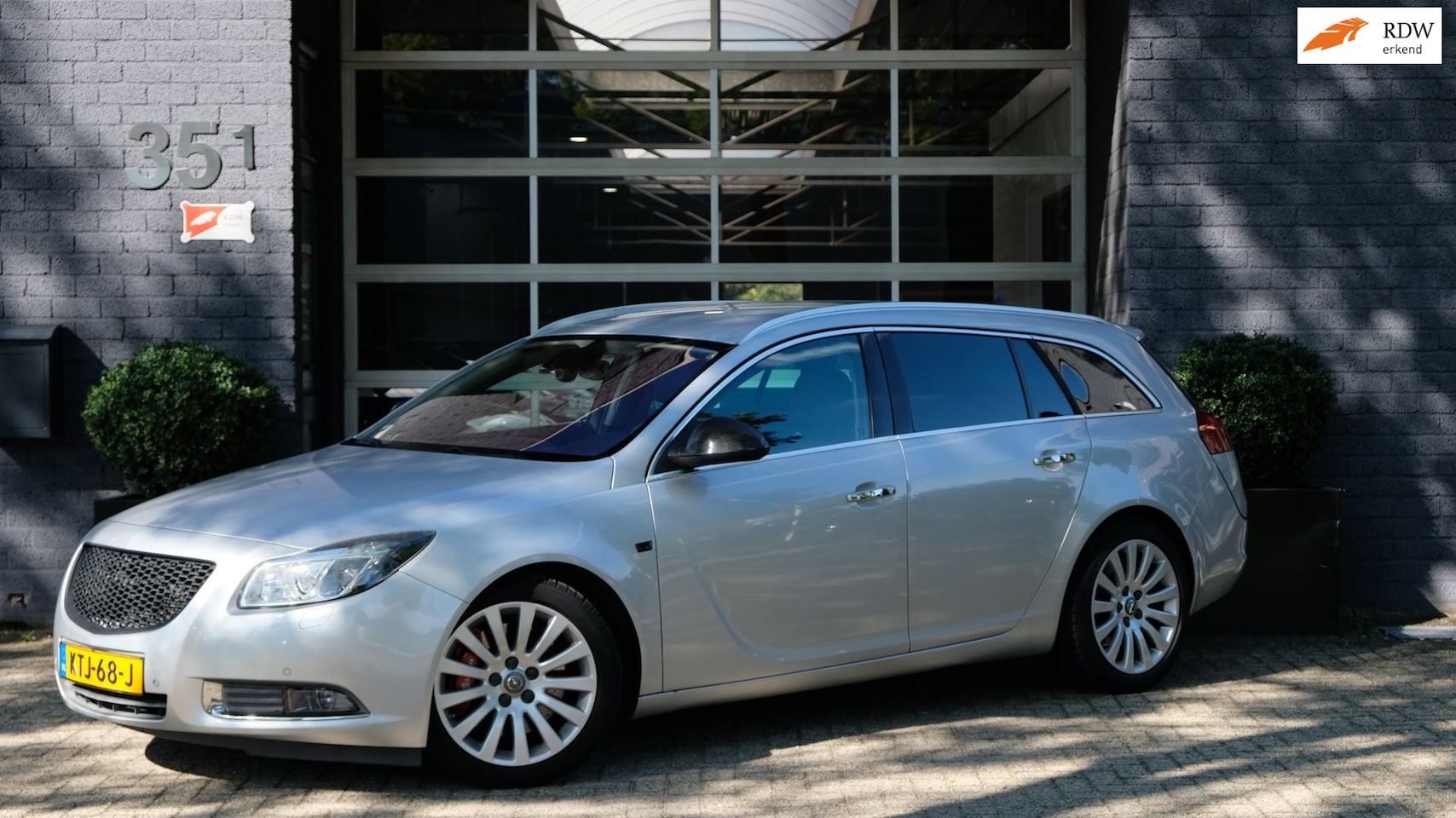 Opel Insignia Sports Tourer - 2.8 T Cosmo 4x4 260PK Leder - AutoWereld.nl