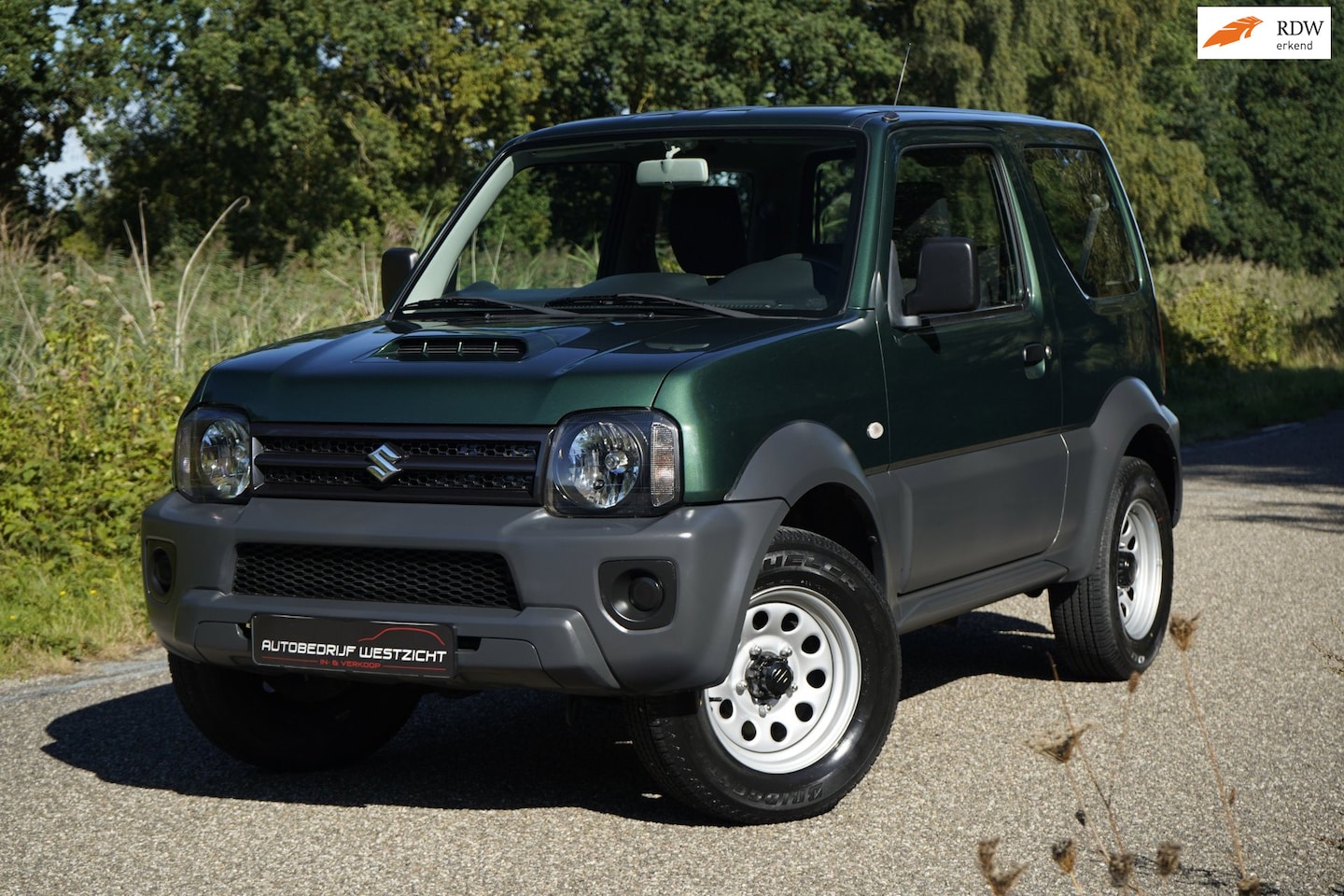 Suzuki Jimny - 1.3 Ranger 4WD, Trekhaak, 2 eigenaren! - AutoWereld.nl