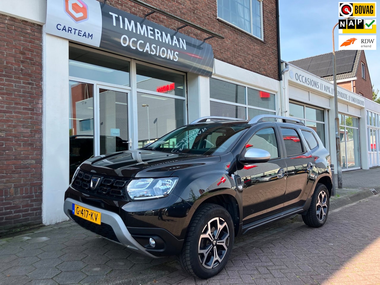Dacia Duster - 1.3 TCe Prestige|Climate Ctrl|Cruise Ctrl|Camera - AutoWereld.nl
