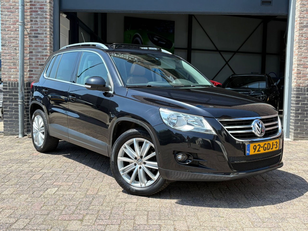 Volkswagen Tiguan - 1.4 TSI Sport&Style 4Motion - AutoWereld.nl