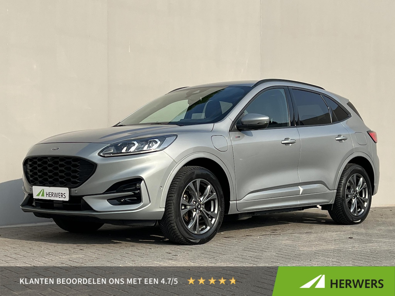 Ford Kuga - 2.5 PHEV ST-Line / Dealer onderhouden / 1.500 kg trekgewicht / Navigatie / Stuur-, stoel- - AutoWereld.nl