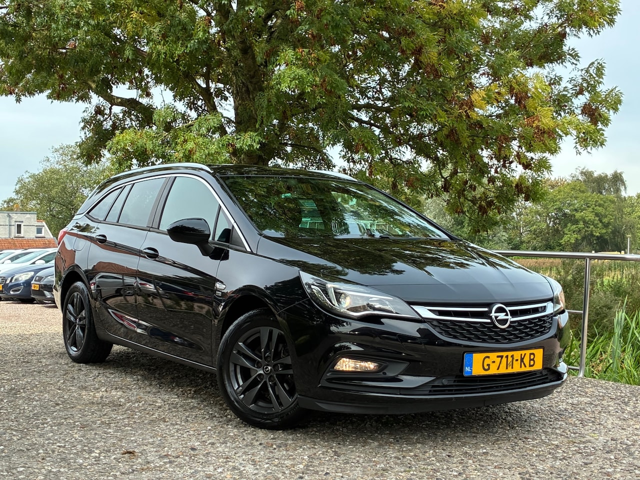 Opel Astra Sports Tourer - 1.0 Turbo 120 Jaar Edition | Navi + Clima + Cruise nu €7.975,-!! - AutoWereld.nl