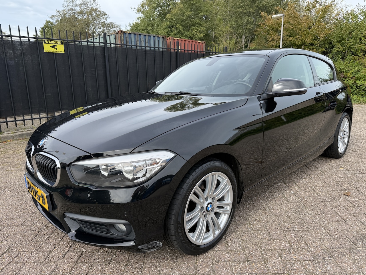 BMW 1-serie - 118i Autom/Tiptr Sportline Navi/Clima/Cruise/PDC/LMV - AutoWereld.nl