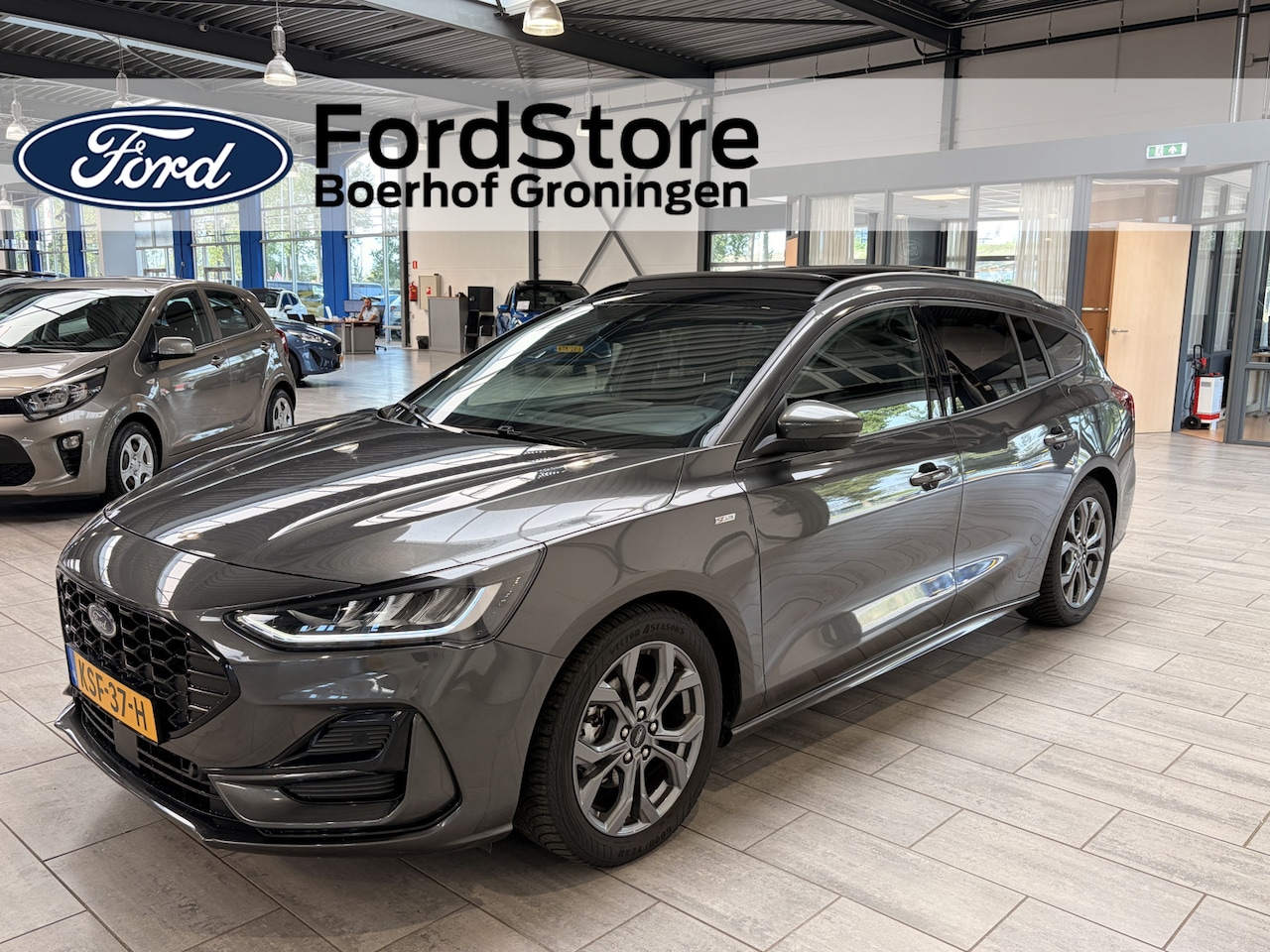 Ford Focus Wagon - EcoBoost Hybrid 155 pk ST-Line | Pano | Winterpack | Cruise control | Climate control | SY - AutoWereld.nl