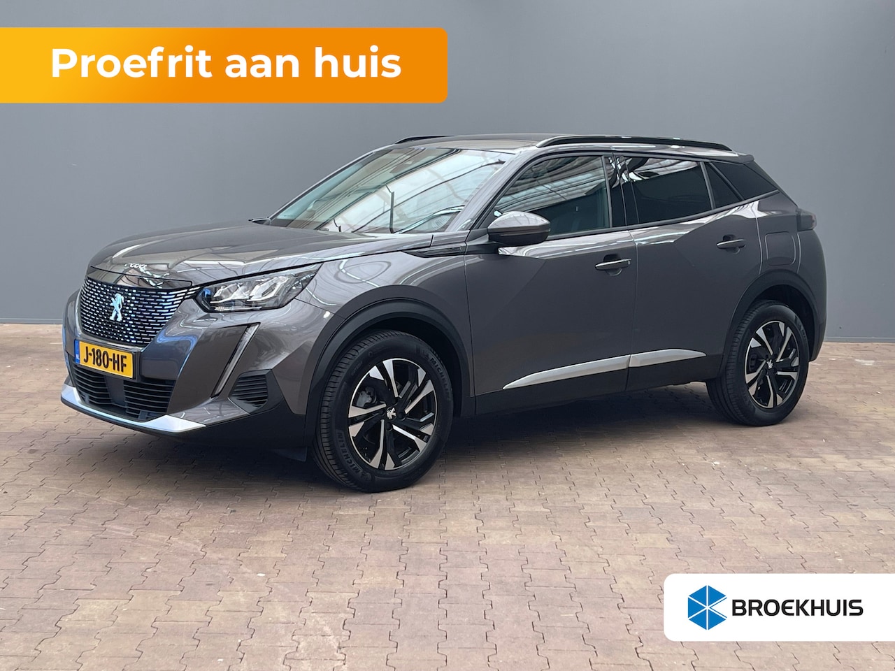 Peugeot 2008 - 1.2 PureTech Allure | Achteruitrijcamera | Climate Control | Cruise Control | Extra getint - AutoWereld.nl