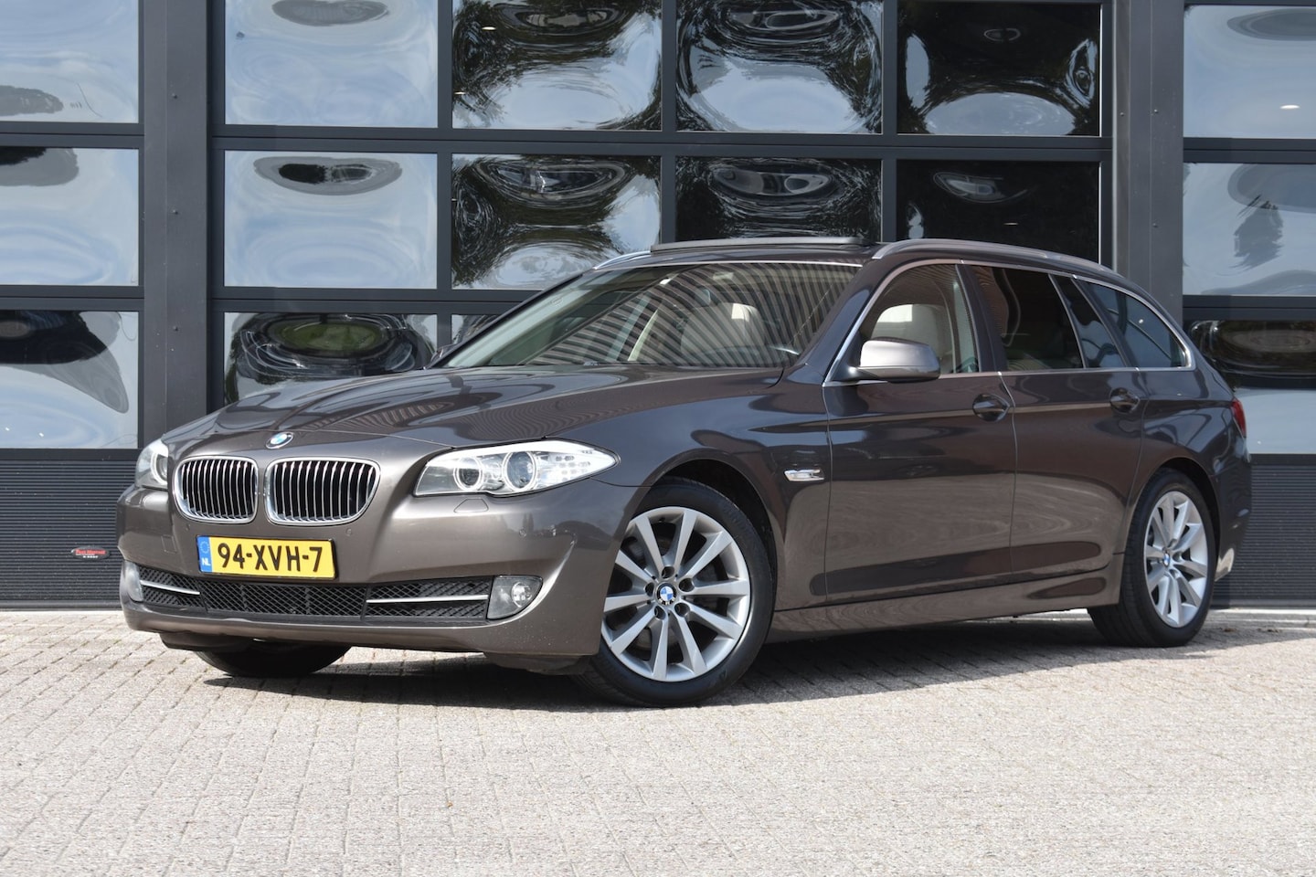 BMW 5-serie Touring - 520d Upgrade Edition '12 Xenon Pano Leder Clima Navi Cruise Inruil mogelijk - AutoWereld.nl
