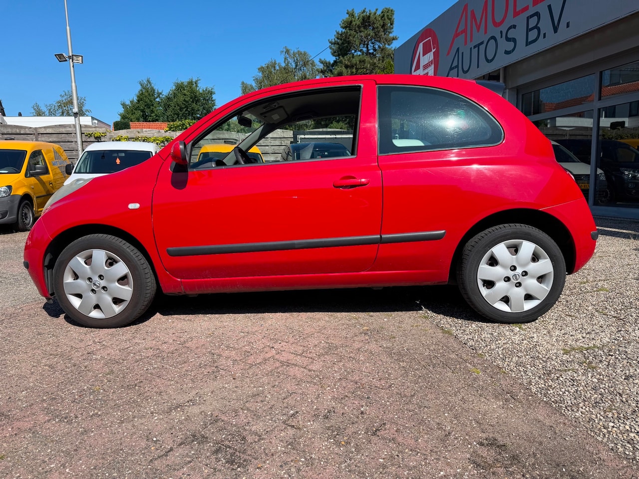 Nissan Micra - 1.2 1.2,59kw/80pk,TEKNA,AIRCO,1e,EIG. - AutoWereld.nl