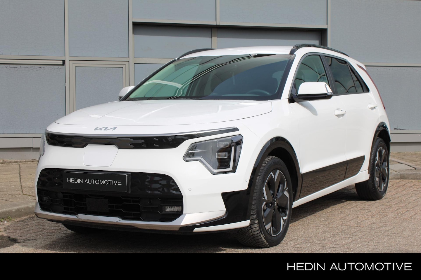 Kia Niro EV - Plus 64.8 kWh l Leer l Stoelverwarming l Stuurverwarming l Privacy-glass l Smart-key l Nav - AutoWereld.nl