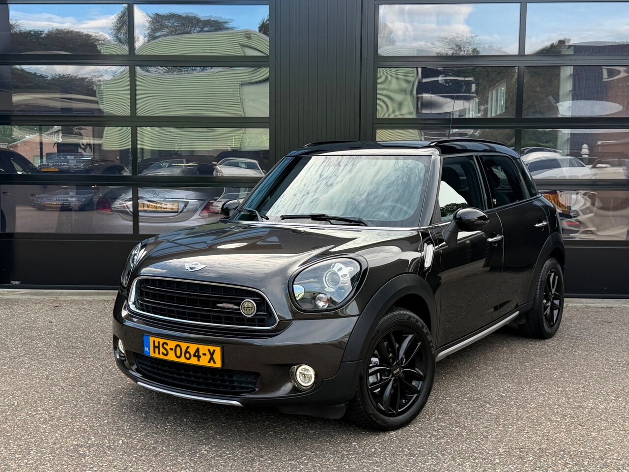 MINI Countryman - 1.6 Cooper Pepper Xenon Navi Clima Aut. - AutoWereld.nl