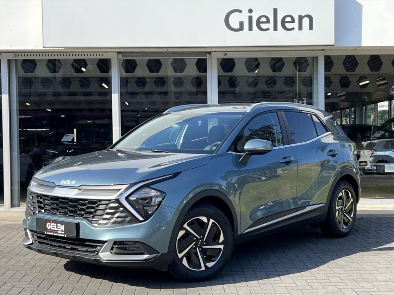Kia Sportage - 1.6 T-GDi MHEV 150PK DynamicLine Automaat | Stoel + Stuurverwarming, Parkeersensoren, Appl - AutoWereld.nl