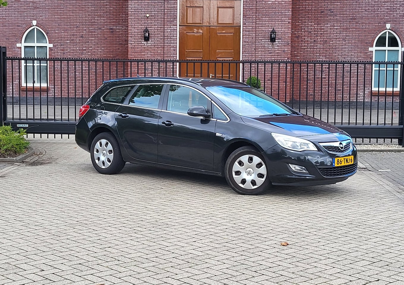 Opel Astra Sports Tourer - 1.4 Business Edition / Airco / Navi / Pdc / Cruise / Nieuwe Apk - AutoWereld.nl