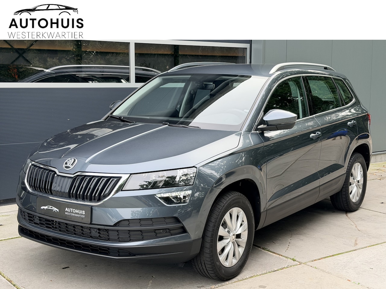 Skoda Karoq - 1.5 TSI 150pk DSG ACT Business Edition Camera Navigatie Trekhaak Stoelverwarming - AutoWereld.nl