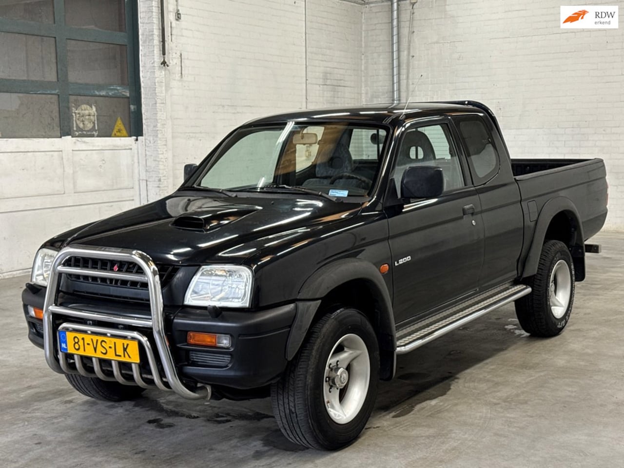 Mitsubishi L 200 - 2.5 Club Cab | 1e eigenaar | Trekhaak - AutoWereld.nl