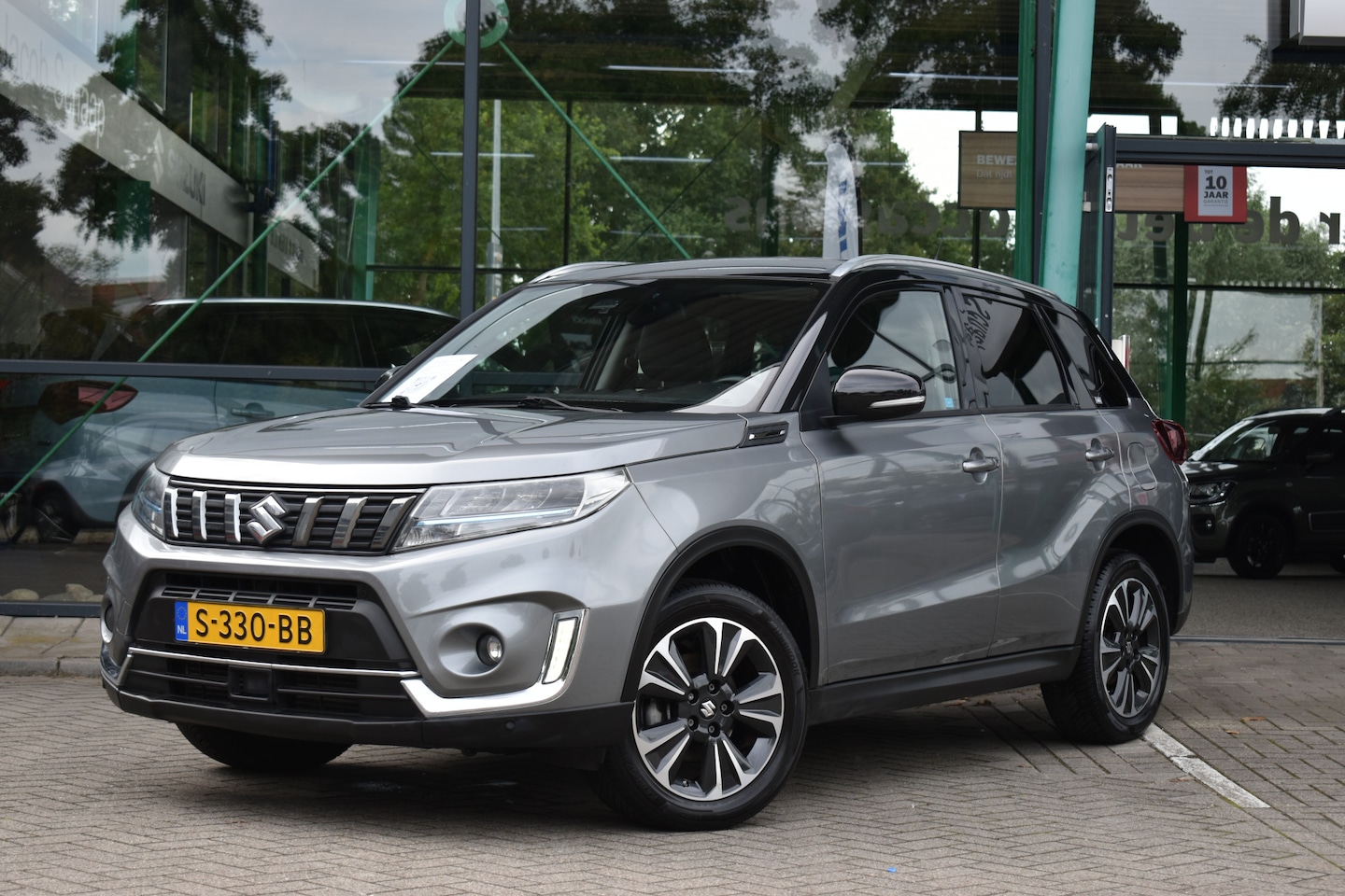 Suzuki Vitara - 1.4 Boosterjet Style Smart Hybrid Handgeschakeld 129pk | Parkeersensoren voor / achter | K - AutoWereld.nl