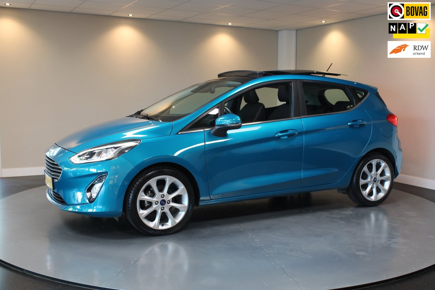 Ford Fiesta - 1.0 EcoBoost Titanium *Pano/Schuifdak* B&O|Carplay|Camera|Adapt.Cruise|All-seasons|Lane-As - AutoWereld.nl