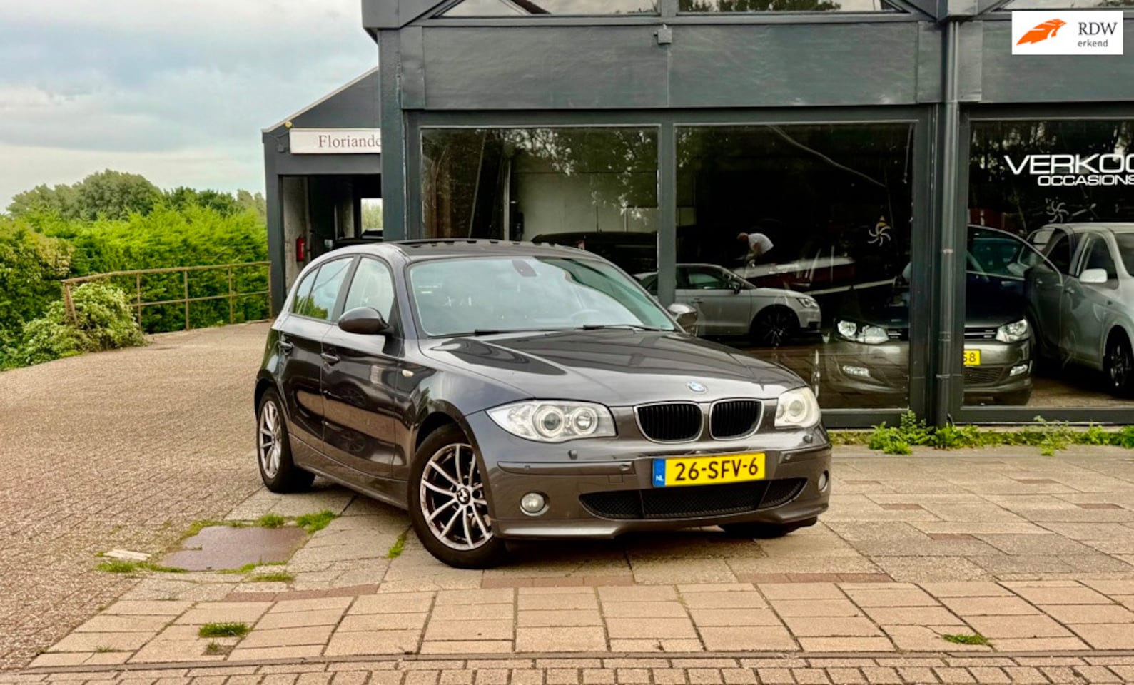 BMW 1-serie - 118i panorama dak - AutoWereld.nl