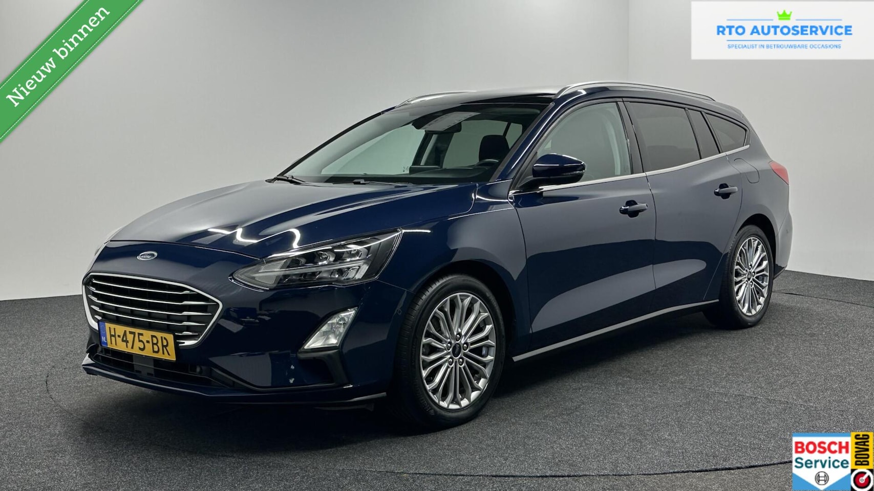 Ford Focus Wagon - 1.0 EcoBoost Titanium Business HEAD UP CARPLAY CAMERA CRUISE LM ECC NAVI. - AutoWereld.nl