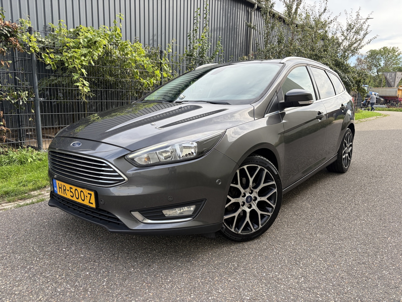 Ford Focus Wagon - 1.0 Titanium Edition / NAVI / CRUISE / AIRCO ECC - AutoWereld.nl